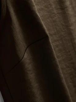 Asymmetrisches Top aus strukturiertem Satin mit Schulterpolstern