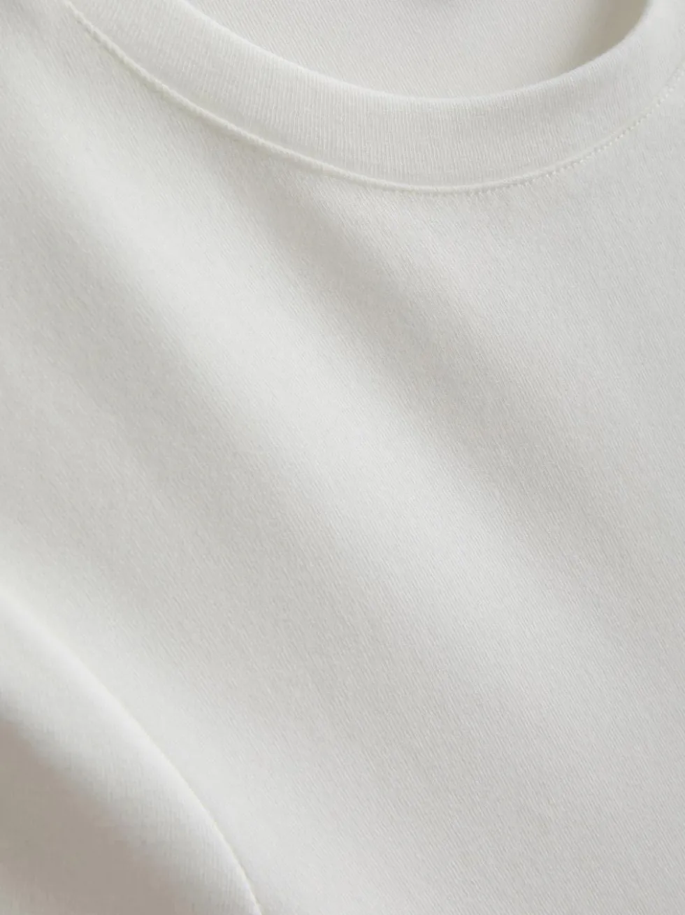 Eng anliegendes „By Coleen“ T-Shirt