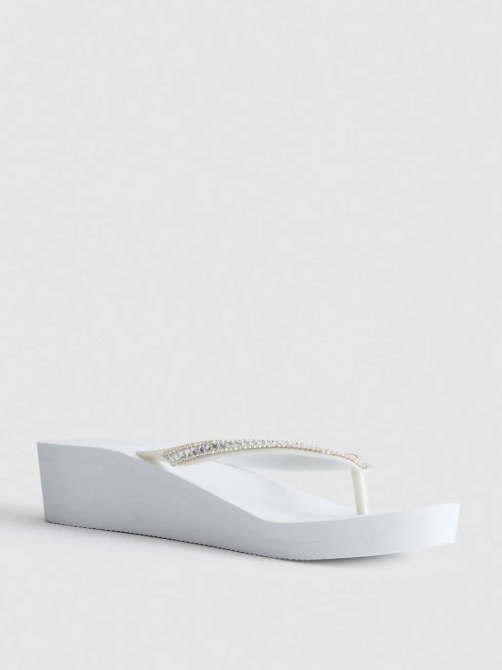 Flipflops mit Keilabsatz und Strasssteinen