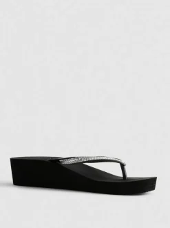 Flipflops mit Keilabsatz und Strasssteinen