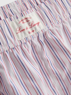 Gestreifte Baumwoll-Schlafshorts mit Room Service-Print