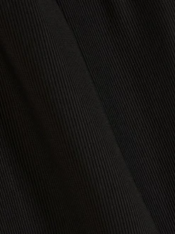 7–15 Jahre | Gerippte Leggings mit ausgestelltem Bein