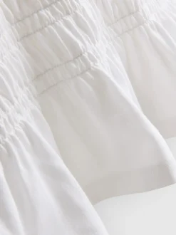 7–15 Jahre | Gesmoktes T-Shirt mit Schößchen