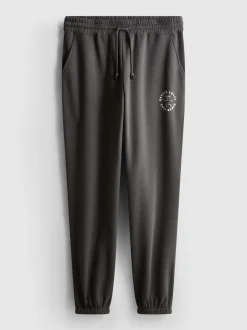 Jogginghose aus Baumwollmischung mit Bündchen und Print