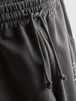 Jogginghose aus Baumwollmischung mit Bündchen und Print