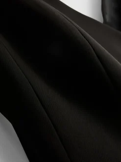 Lila Top mit V-Ausschnitt und Schößchen
