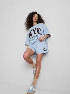 Lässige „NYC“ Shorts mit hohem Baumwollanteil
