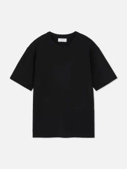Lässiges Baumwoll-T-Shirt mit eingefasstem Ausschnitt