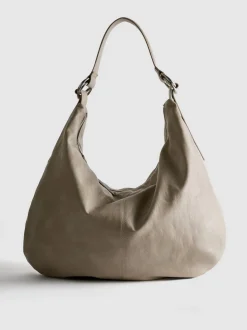 Lässige Schultertasche mit Zierringen
