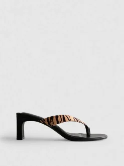 Mules mit Animalprint und Zehensteg