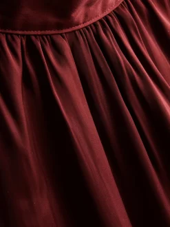 Neckholder-Bluse mit Ballonsaum