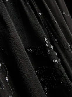 Perlenbesetzte „Paula Echevarría“ Netzstoffhose mit weitem Bein