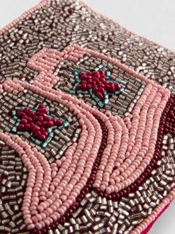 Perlenbesetzte Tasche mit Westernstiefeln