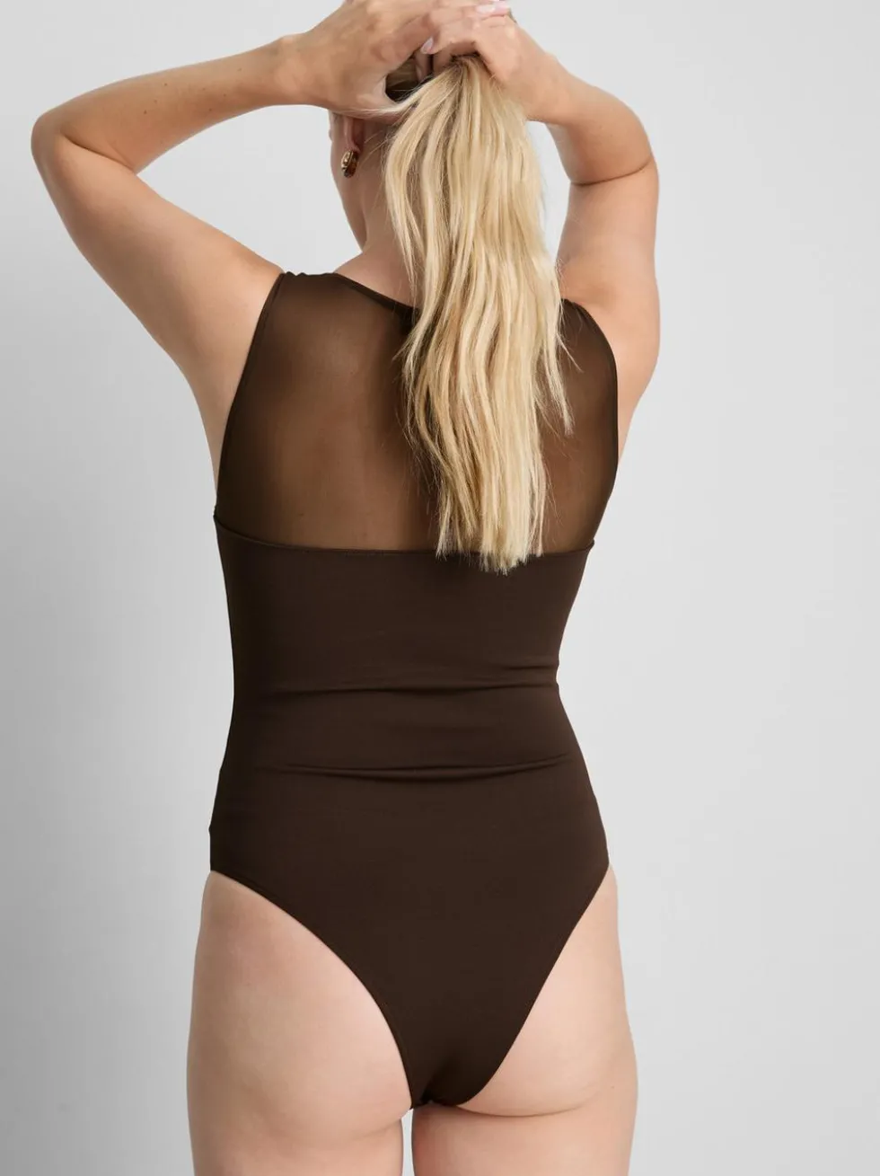 Ärmelloser Body mit Netzeinsatz