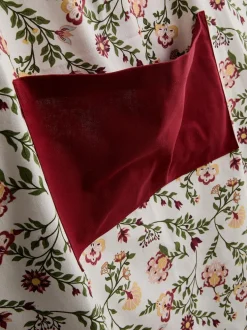 Schürze mit Blumenmuster und Tasche