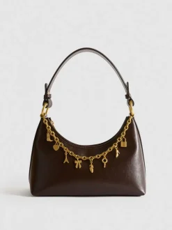 Schultertasche mit Anhängern