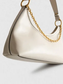 Schultertasche mit Zierkette