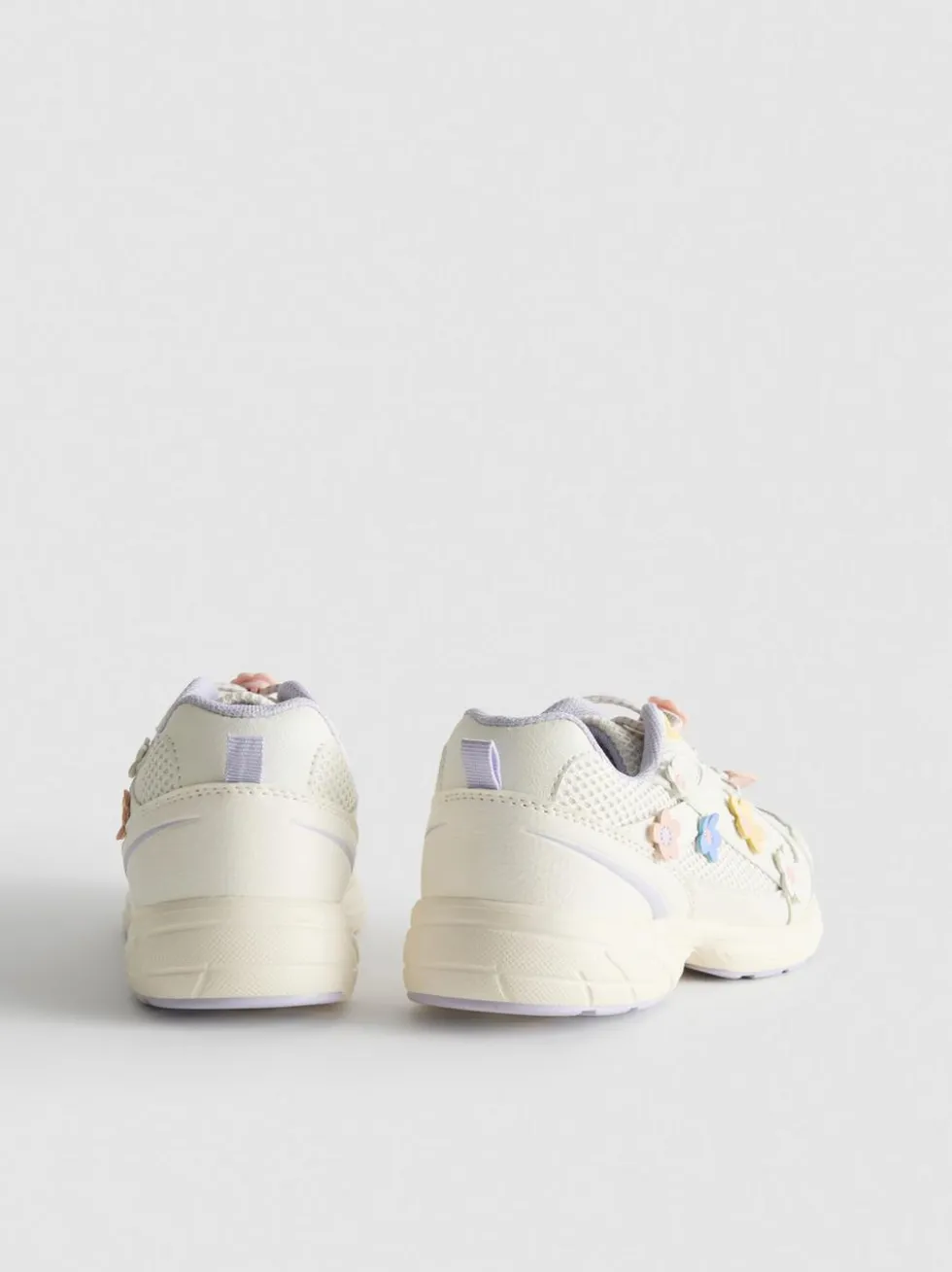 Sneaker mit dicker Sohle und Blumenmuster