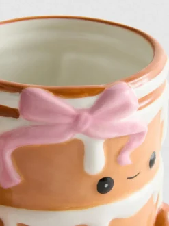 Tasse im Zimtschneckendesign